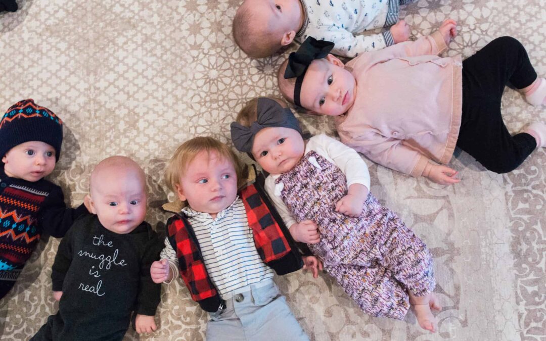 Babies laying in a circle