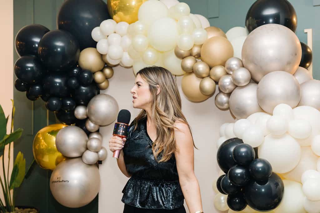 A women holding a microphone